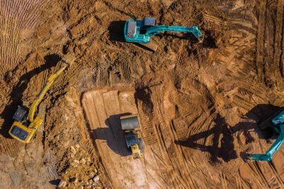 aerial-view-road-motor-grader-flatting-dirt-road-s-2026-01-07-00-17-30-utc.jpg